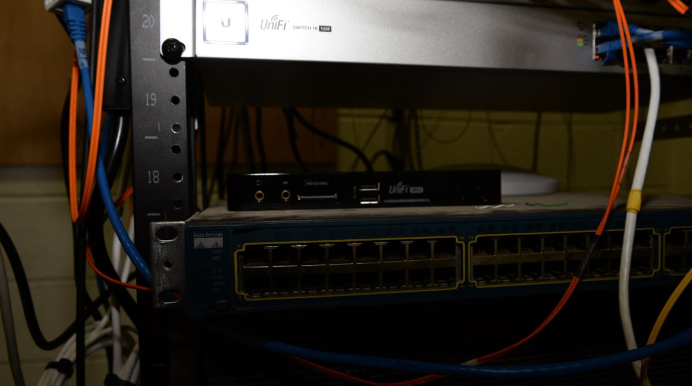 Neatly routed network cables connecting servers in a rack