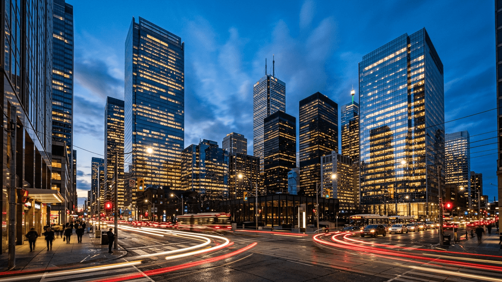Toronto financial district towers lit at blue hour